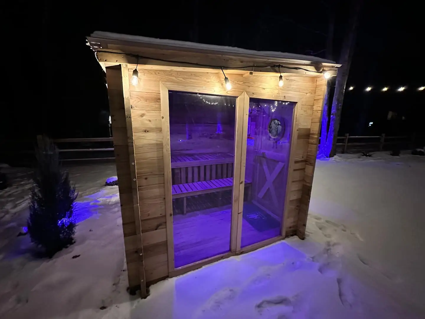 Après-ski at the chalet — the backyard sauna glowing after a night session at Big Boulder.